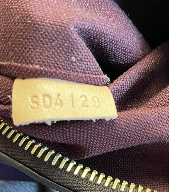 LOUIS VUITTON Monogram Rivoli PM Brown