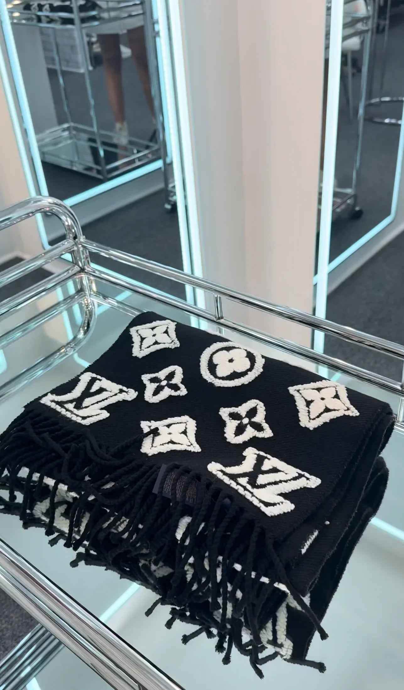 Hermes silk scarves, Bottega Veneta wallets, Chanel